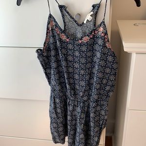 Blue romper with white design